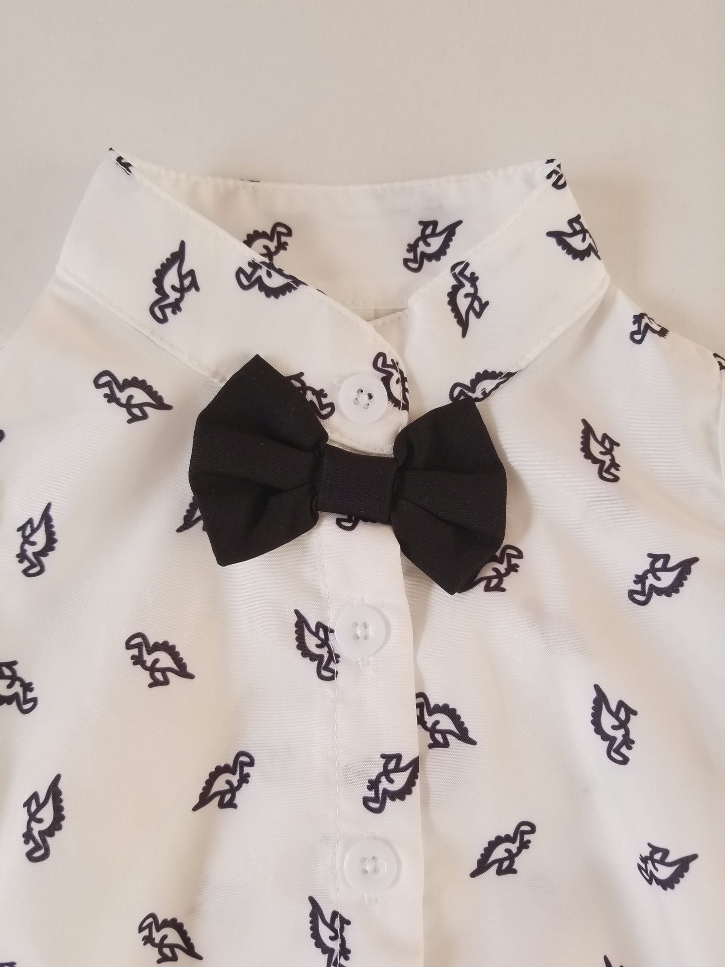 Conjunto short tirantes estampado Dinosaurio