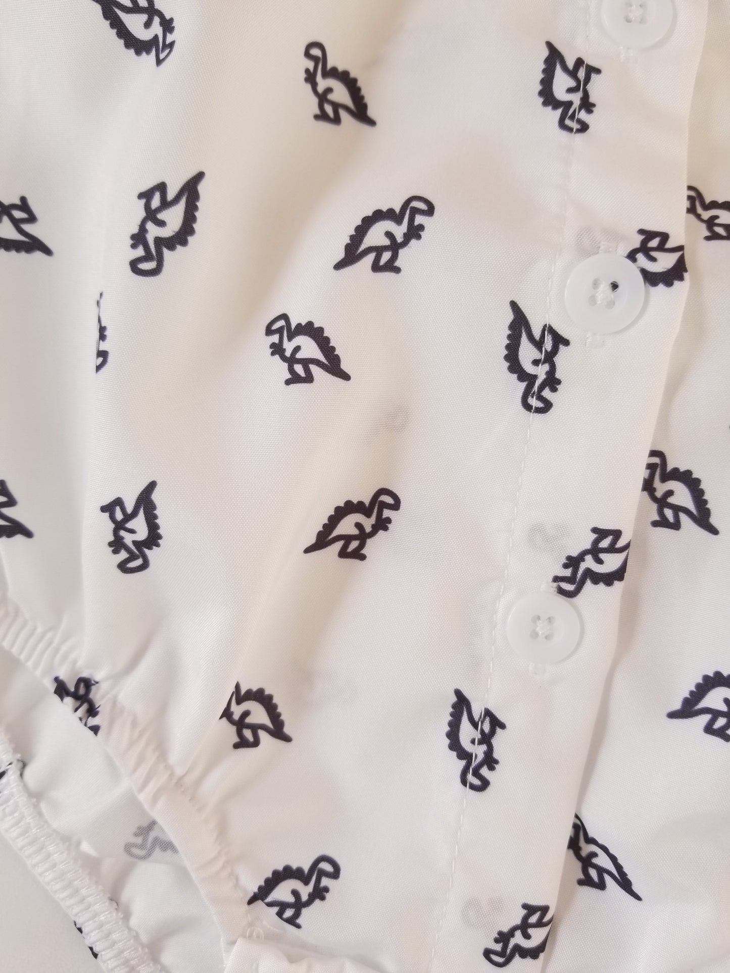 Conjunto short tirantes estampado Dinosaurio