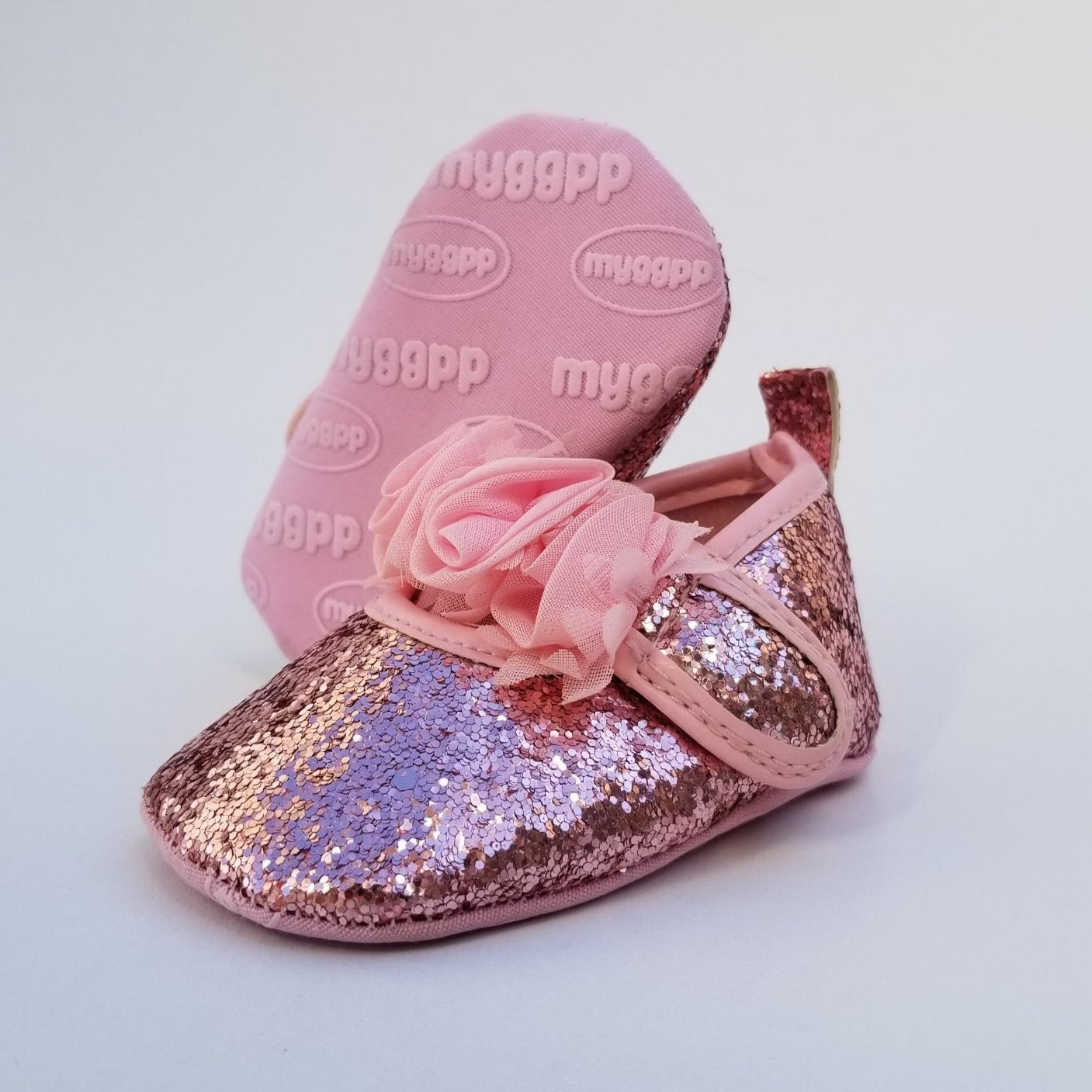 Zapatos de lentejuelas y flores