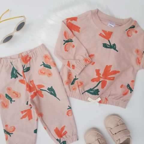 Conjunto de flores anaranjadas