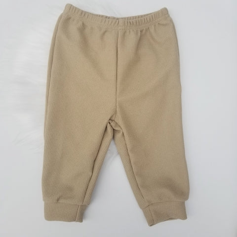 Conjunto suéter cuello y pantalón
