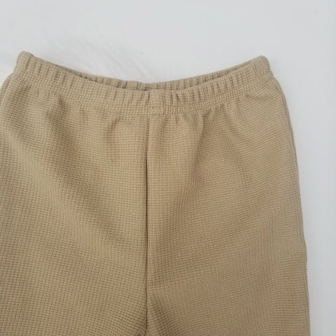 Conjunto suéter cuello y pantalón