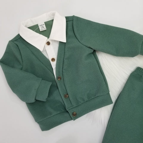 Conjunto suéter cuello y pantalón