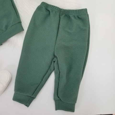 Conjunto suéter cuello y pantalón