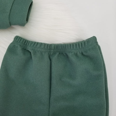 Conjunto suéter cuello y pantalón