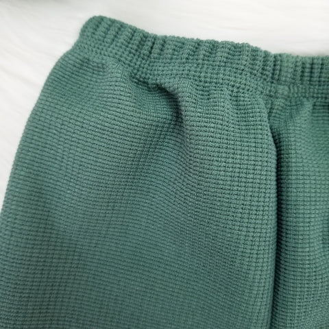 Conjunto suéter cuello y pantalón