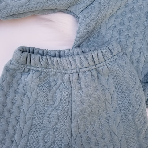 Conjunto Raglán