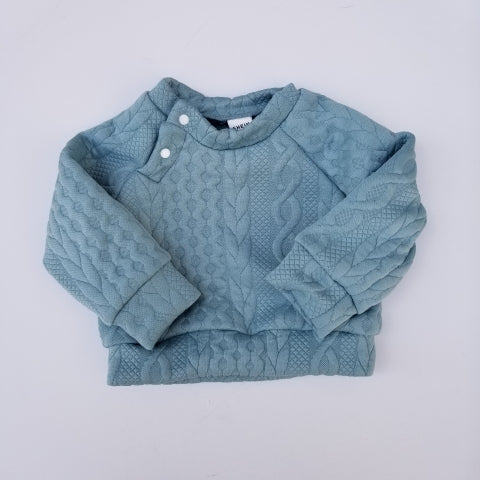 Conjunto Raglán