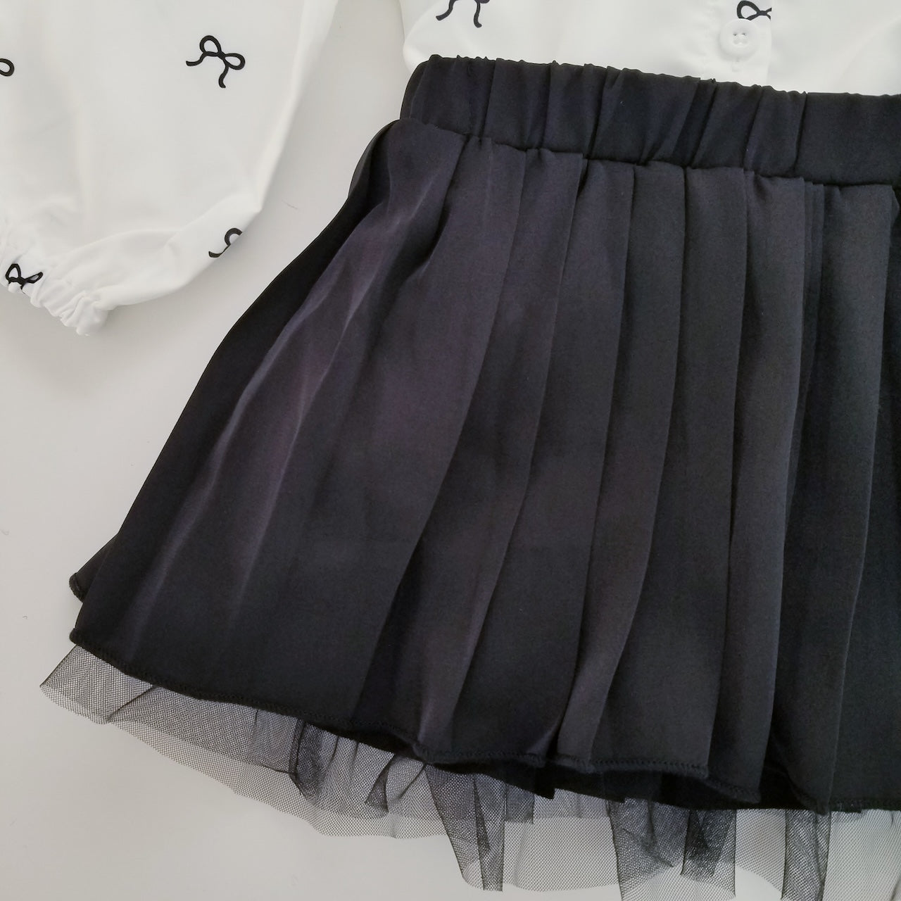 Conjunto de camisa y falda