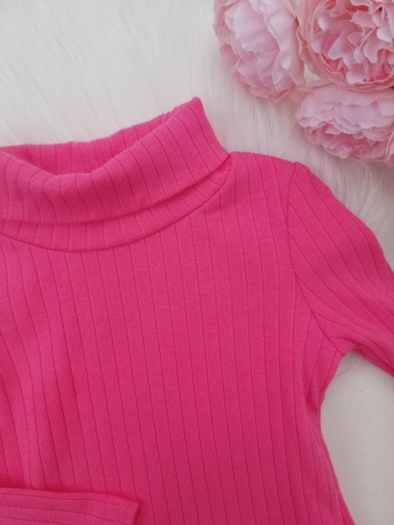 Conjunto de pantalón y suéter de cuello
