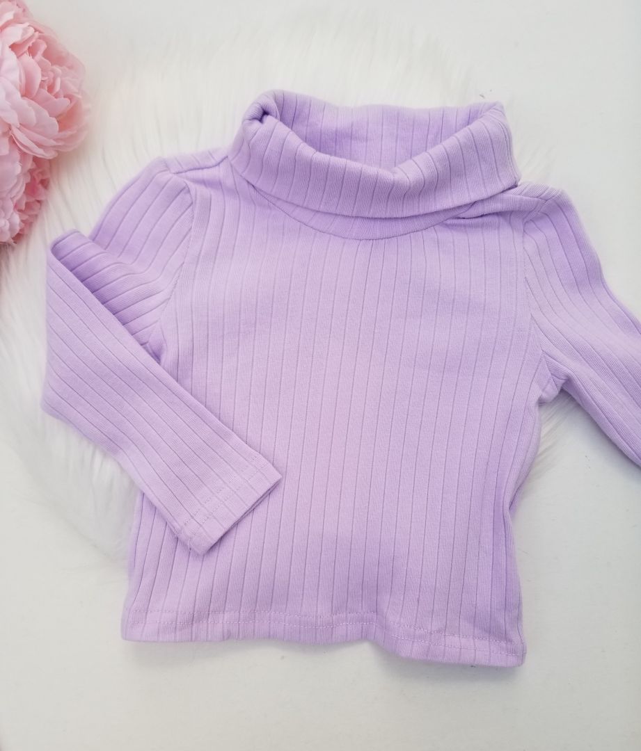 Conjunto de pantalón y suéter de cuello
