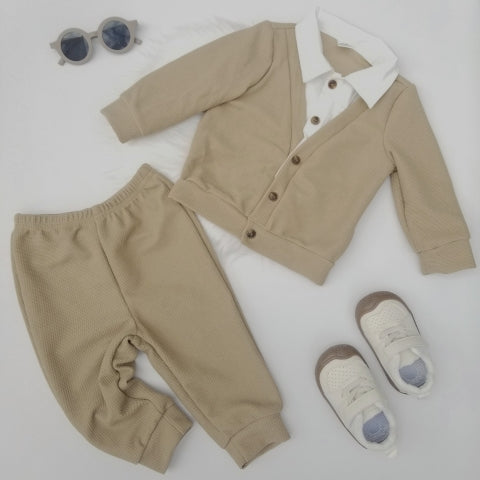 Conjunto suéter cuello y pantalón