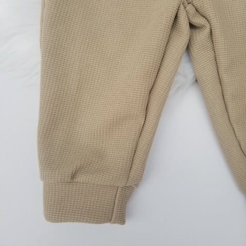 Conjunto suéter cuello y pantalón