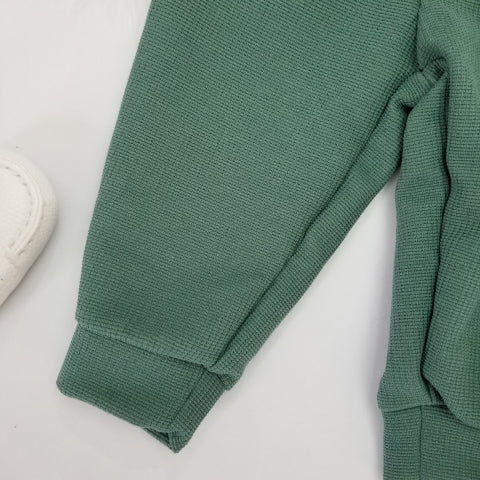 Conjunto suéter cuello y pantalón