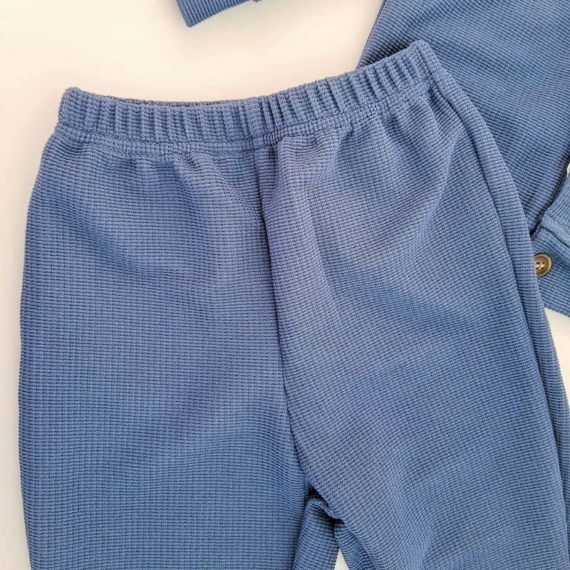 Conjunto suéter cuello y pantalón