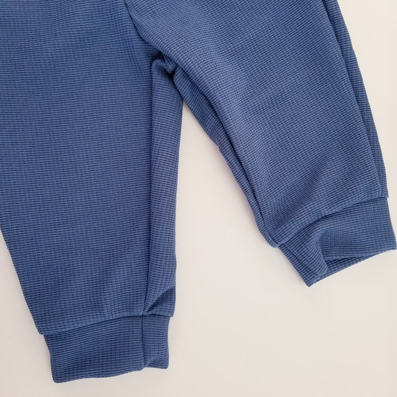 Conjunto suéter cuello y pantalón