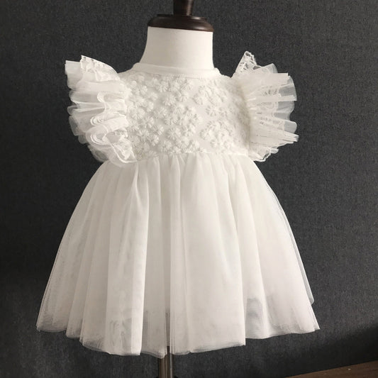 Vestido de tul con mangas de volantes