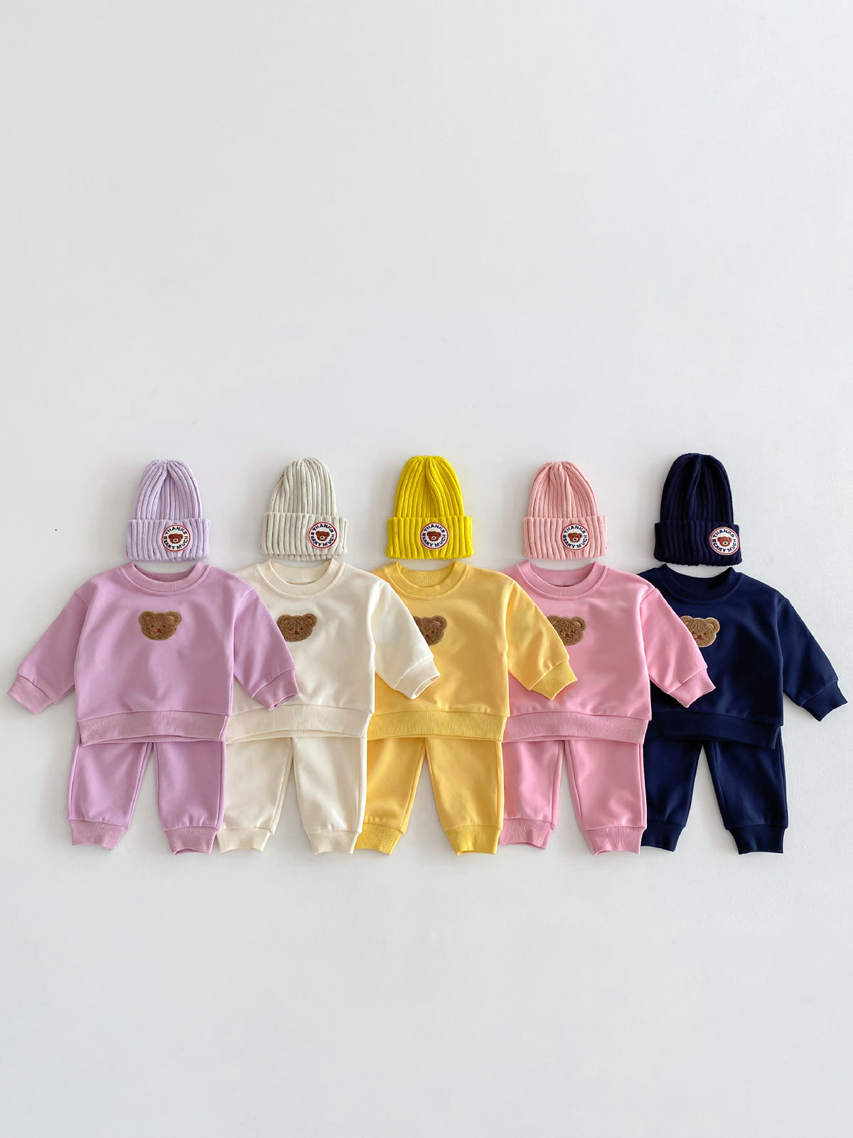 Conjunto buzo con oso bordado