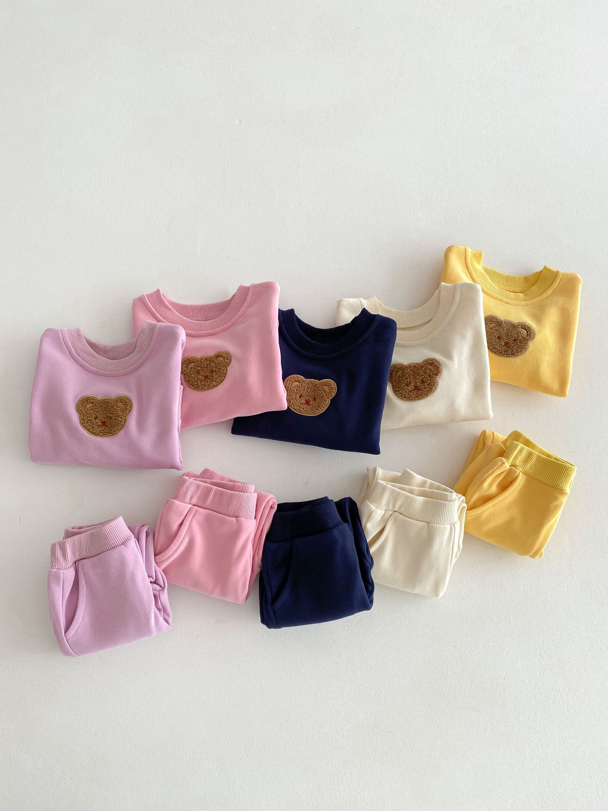 Conjunto buzo con oso bordado