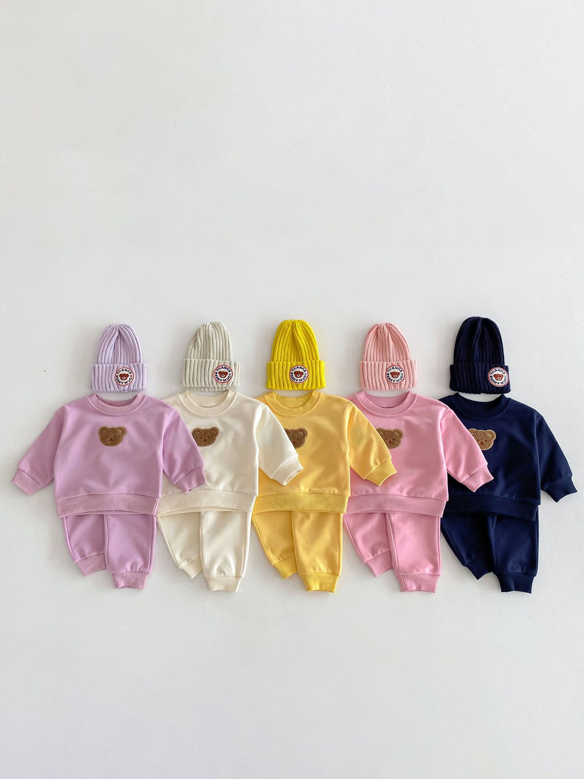 Conjunto buzo con oso bordado
