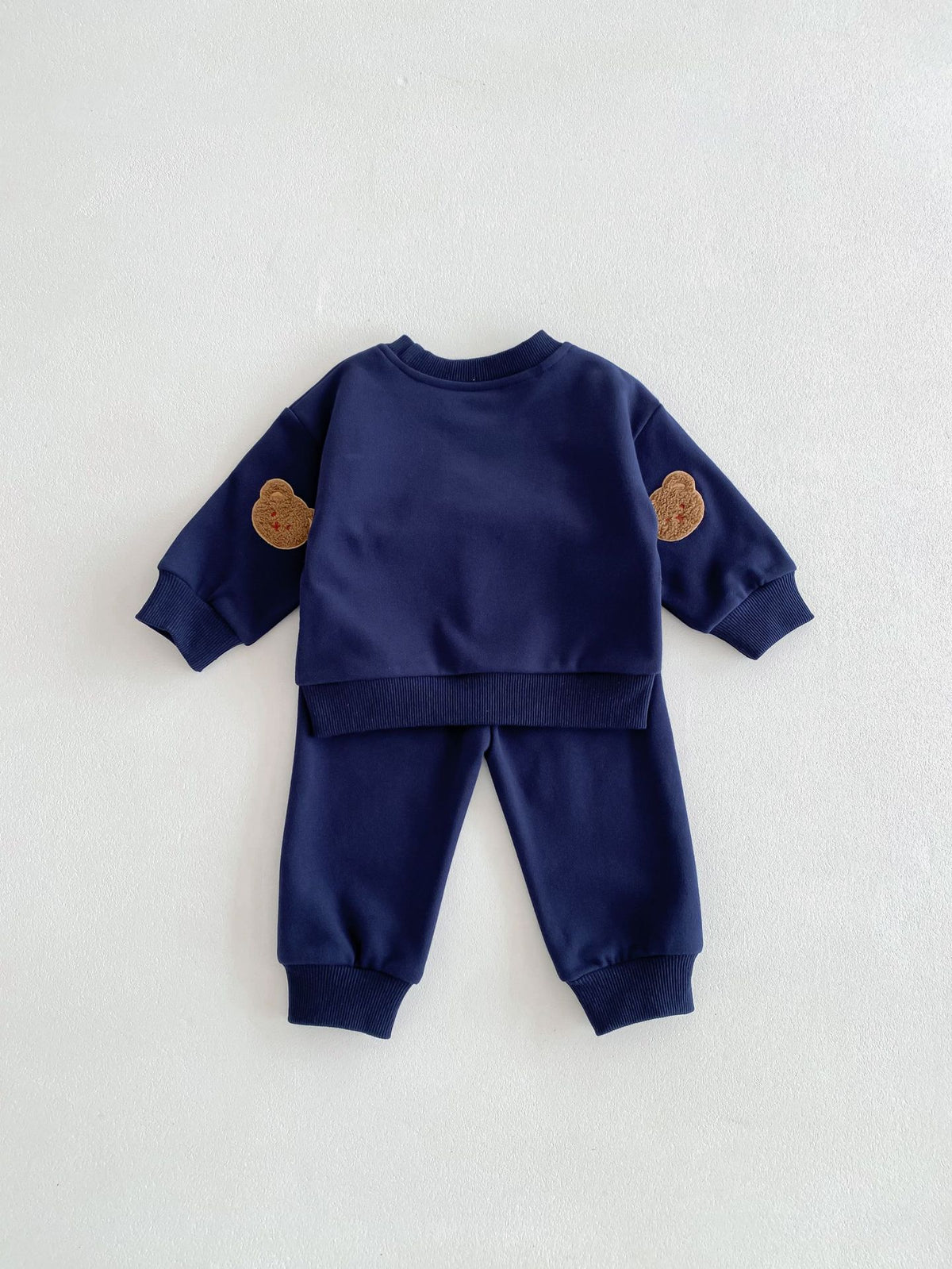 Conjunto buzo con oso bordado