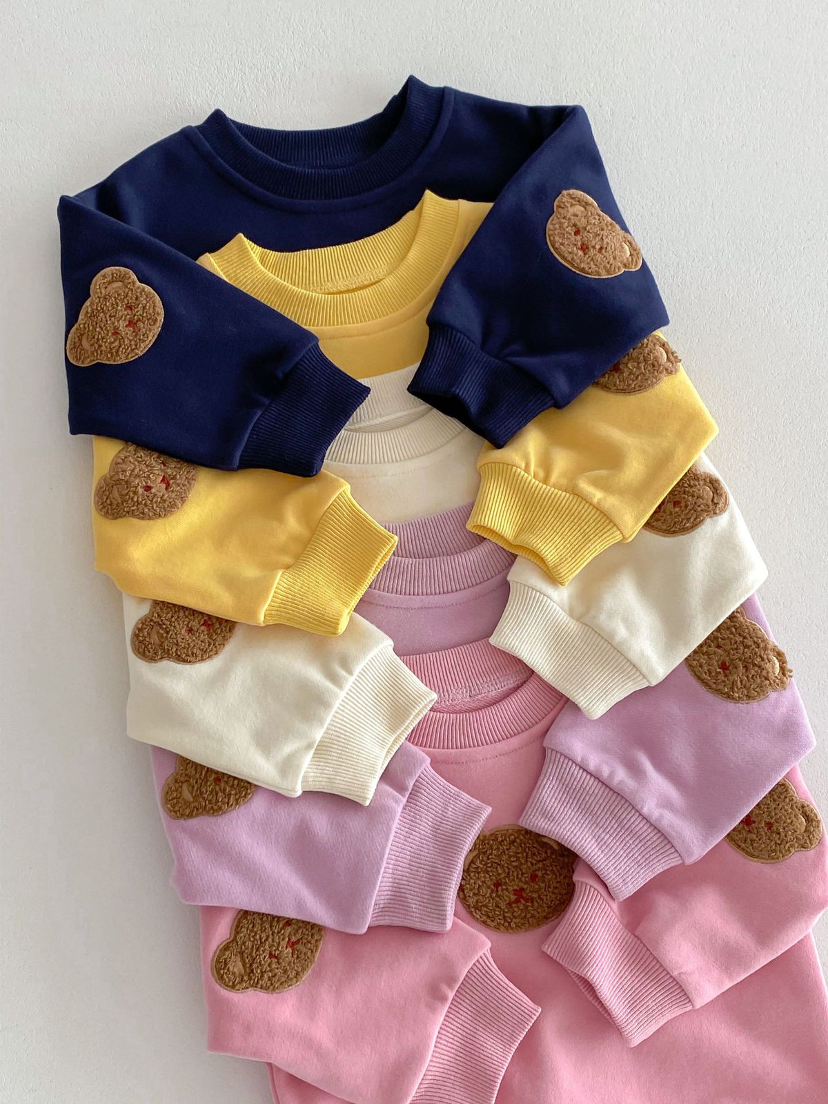 Conjunto buzo con oso bordado