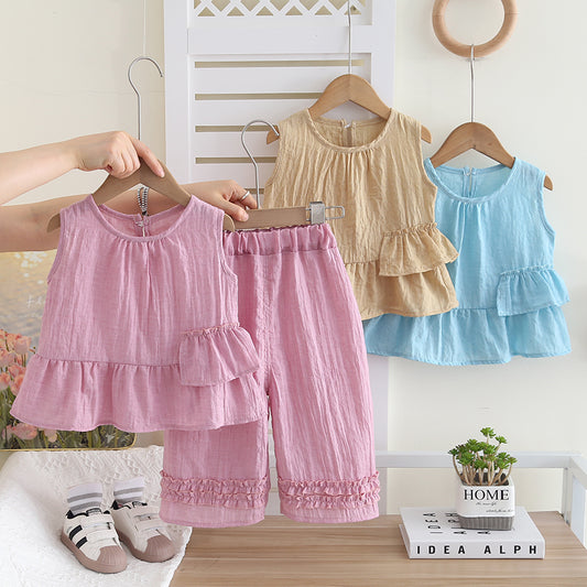 Conjunto blusa y pantalón con volantes