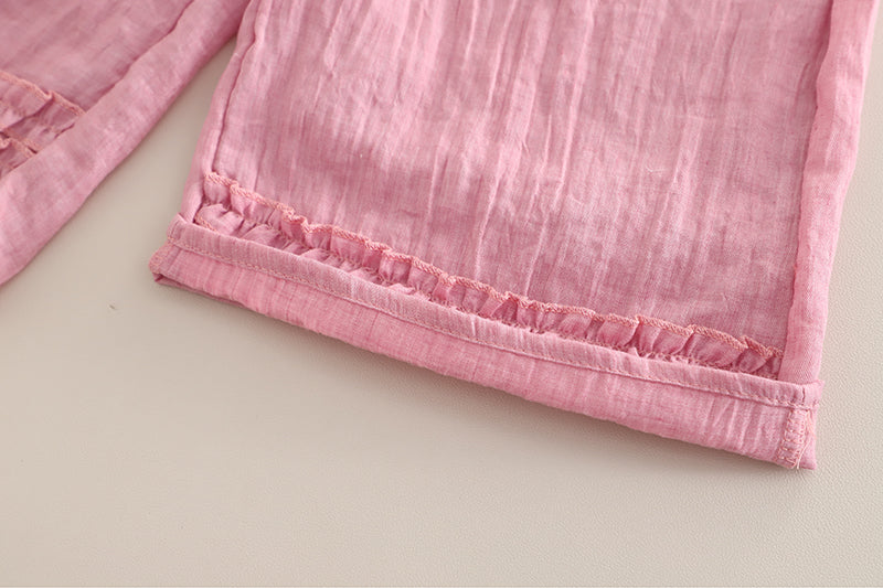 Conjunto blusa y pantalón con volantes
