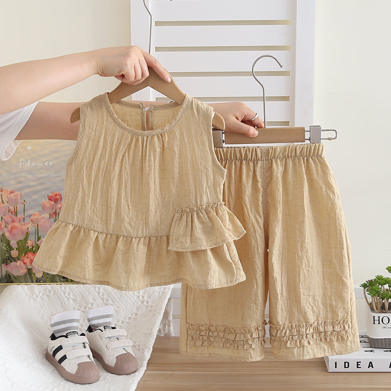 Conjunto blusa y pantalón con volantes