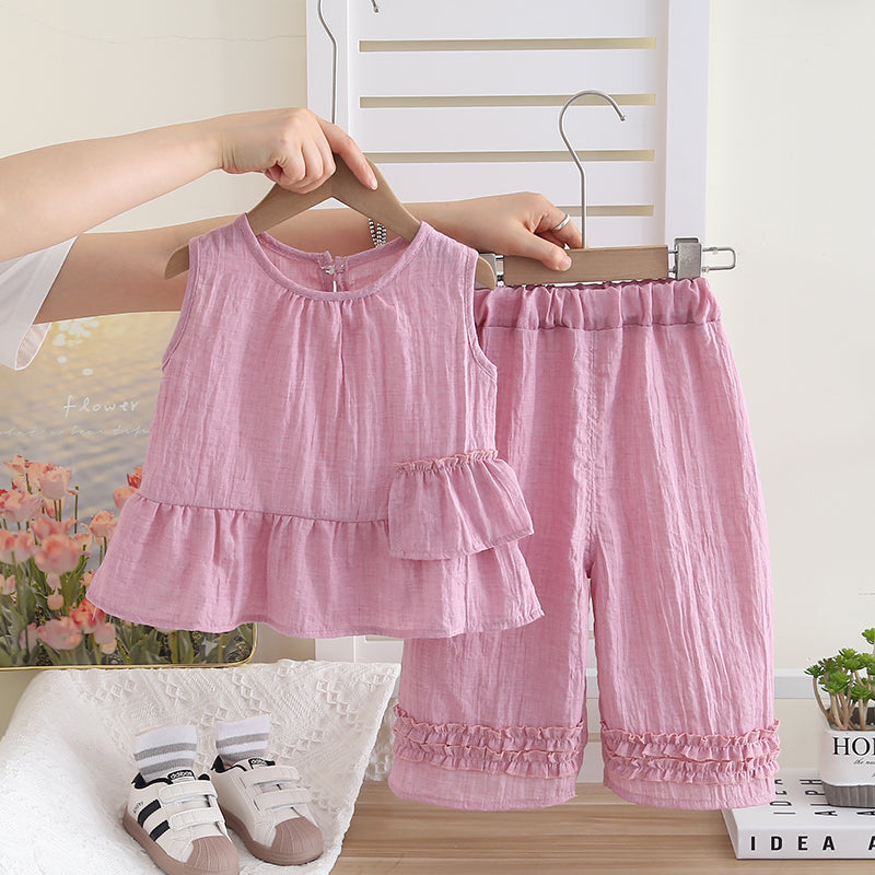 Conjunto blusa y pantalón con volantes