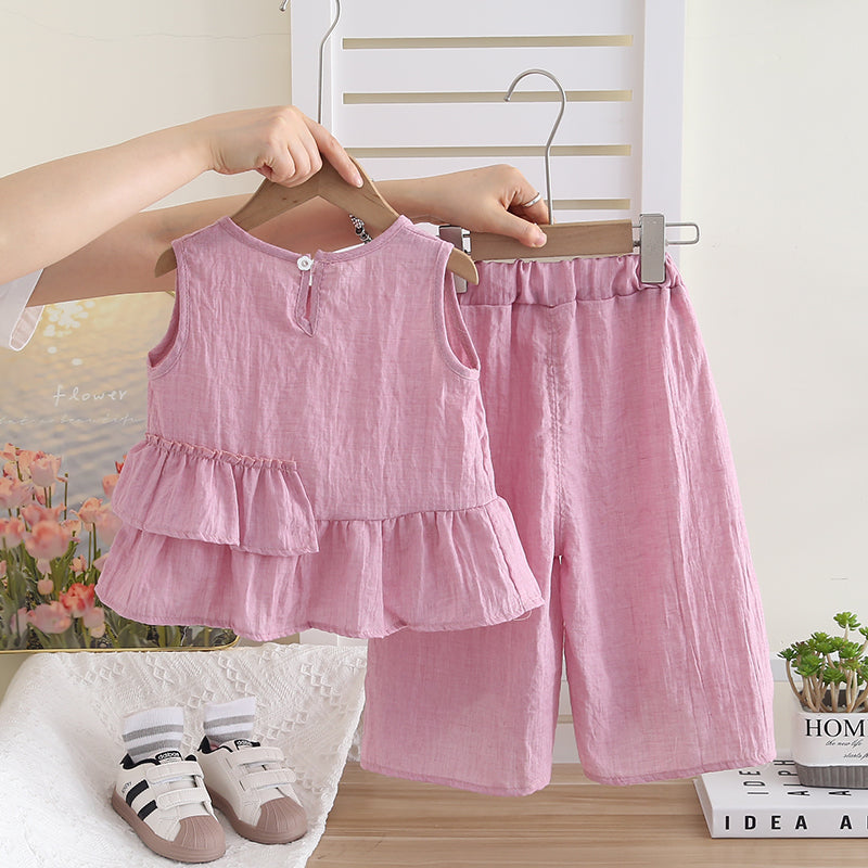 Conjunto blusa y pantalón con volantes