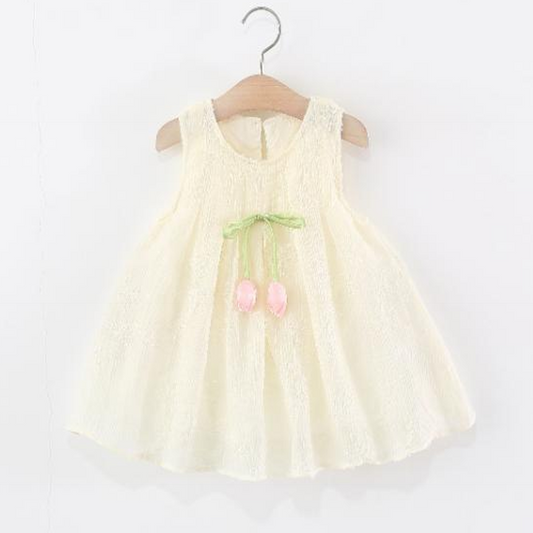 Vestido crema con flor