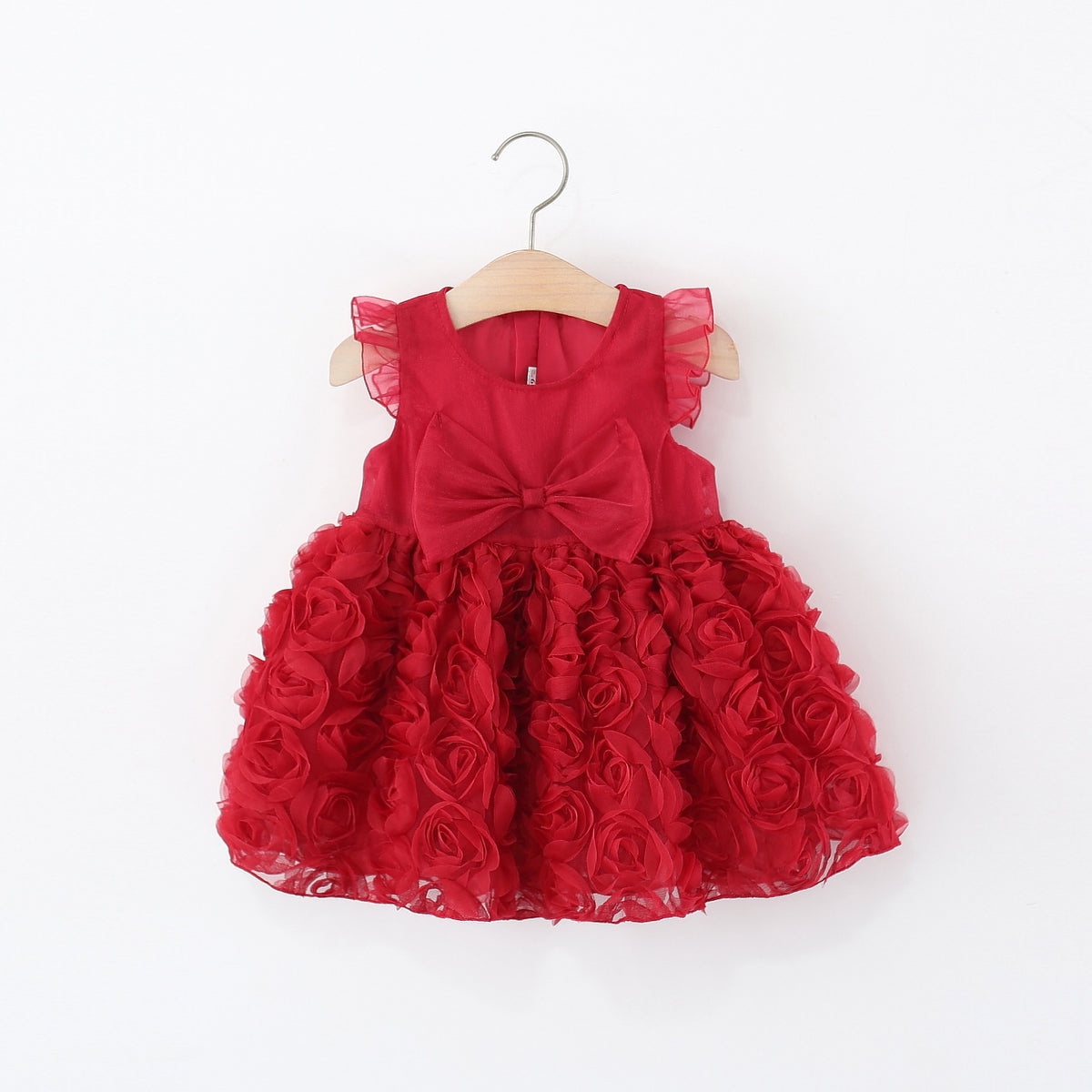 Vestido de tul con volantes y lazo